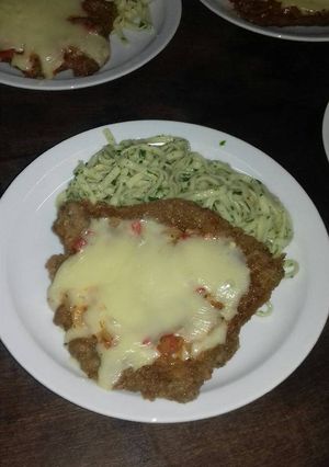 Una foto de Napolitanas con fideos al pesto