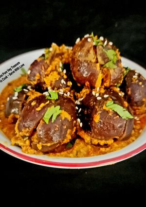 A picture of Traditional Maharashtrian Bharli Vangi (Stuffed Eggplant).