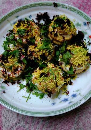 A picture of Dahi vada with a twist of monaco biscuits!.