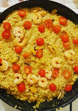 Une photo de Risotto Coco Curry Moules et Crevettes