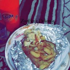 A picture of Irish with onions source an fried egg.
