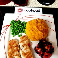 A picture of My Grilled Chicken with Butternut Squash Potatoes and cold Salad.