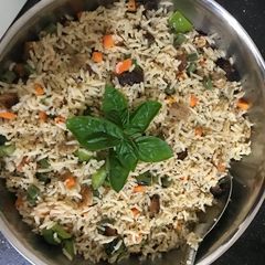 A picture of Basil with brad croutons rice.