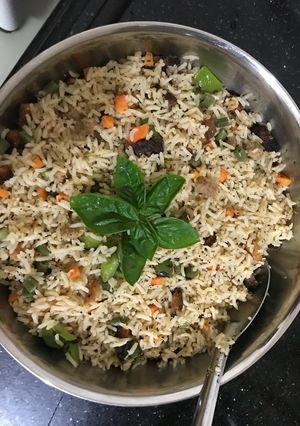 A picture of Basil with brad croutons rice.