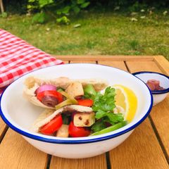 A picture of Greek pitta pockets with lemon Quorn.