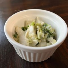A picture of Nappa cabbage salad with tofu Caesar dressing.