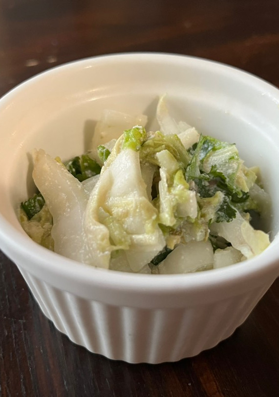 A picture of Nappa cabbage salad with tofu Caesar dressing.