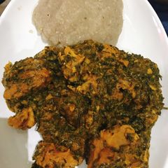 A picture of Vegetable soup and eba.