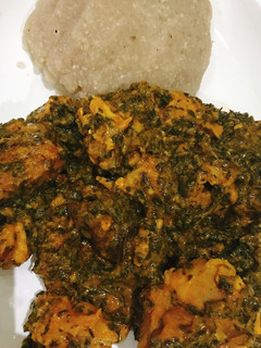 A picture of Vegetable soup and eba.