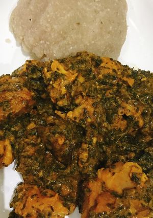 A picture of Vegetable soup and eba.