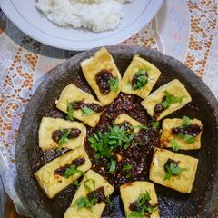 A picture of Fried Tofu with Peanut and Kecap Sambal (Indonesian Tahu Bumbu).