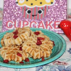 A picture of Strawberry Infused Snowflake Breakfast Waffles.