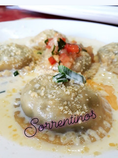 Una foto de Sorrentinos rellenos acelga