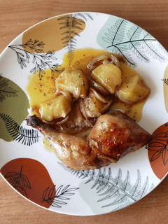 Una foto de Muslos de pollo al horno