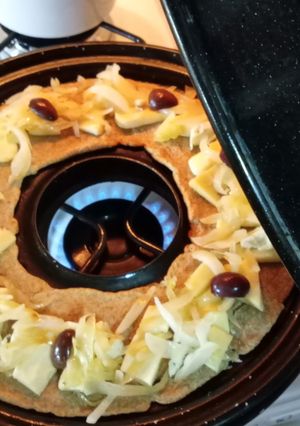 Una foto de Pizza -La Integral de Cebolla y Queso -En la Parrilla 🍕