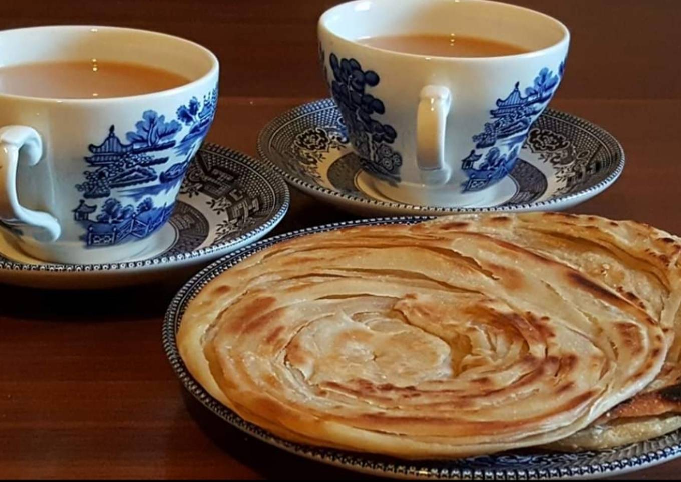 Tea with crispy laccha paratha