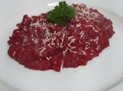 Una foto de risotto remolacha