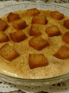 Una foto de Gachas de leche con tostones
