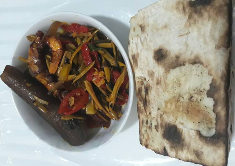 Roasted yam with ugba sauce