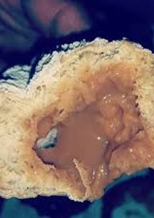 Una foto de Donas rellenas de arequipe