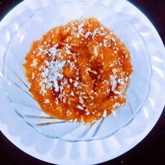 A picture of Delicious healthy tasty persimmon and pears dry fruits halva.