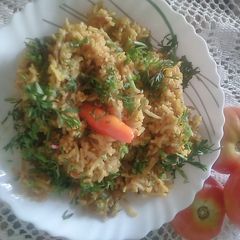 A picture of Tangy Tomato Pulao.