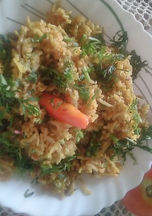 A picture of Tangy Tomato Pulao.