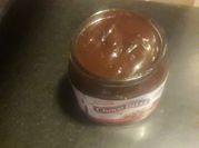 A picture of chocolates or chocolate syrup