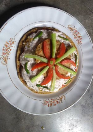 A picture of Gram flour pan pizza.