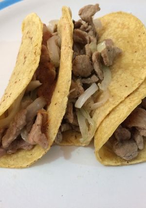 Una foto de Milanesa encebollada