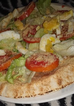 Una foto de Pizza rápida con pan pita