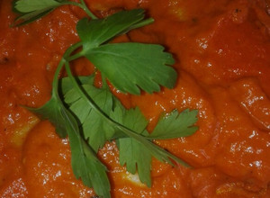 Foto principal de Lomos de merluza con salsa de piquillos