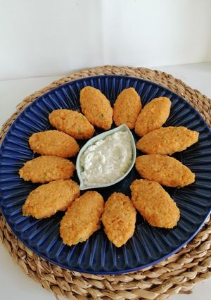 Una foto de Kibbeh de lentejas rojas, bulgur y calabaza