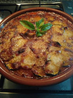 Una foto de Parmesana de calabacines