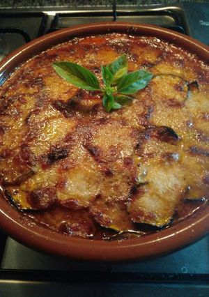 Una foto de Parmesana de calabacines