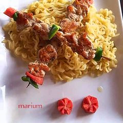 A picture of Chicken Malai boti with noodles🍝🍡🍢.