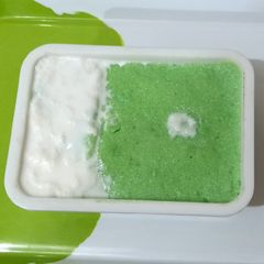 A picture of Sooji ka halwa with fresh cream.