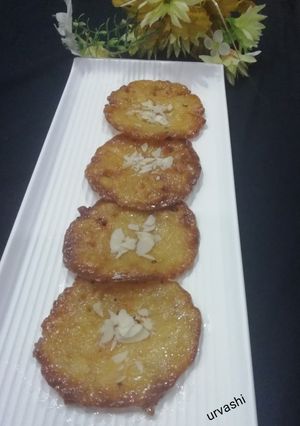 A picture of Wheat flour rabdi malpua.