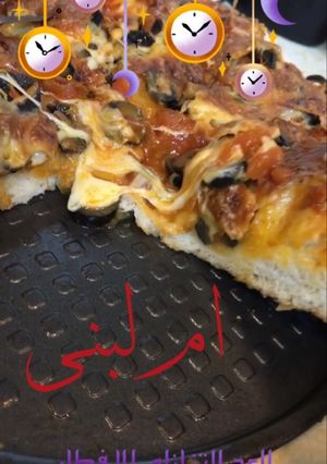 صورة لوصفة بيتزا لذيذة وهشه