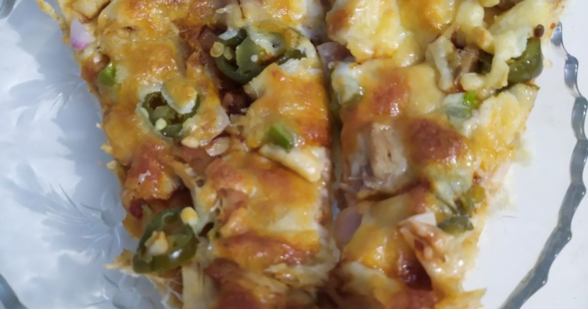 Cheesy Pizza Recipe by Saira Abdul Basit Khatri - Cookpad