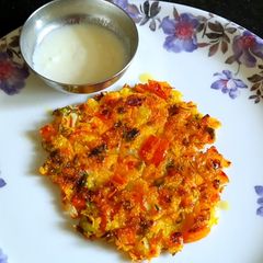 A picture of Mixed vegetable rava roti / dosa.