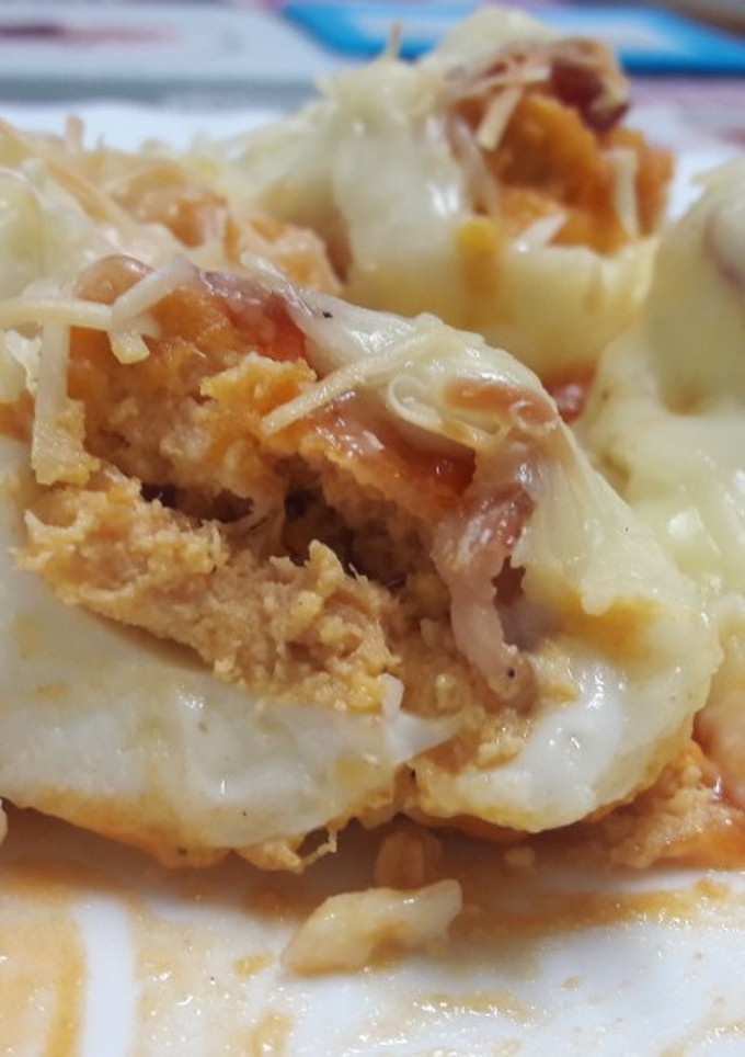 Una foto de Huevos rellenos gratinados