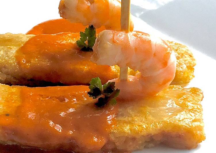 Pencas rellenas de velouté de gambas en salsa de sus cabezas