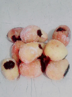 A picture of The Happiness with Chocolate filled mini donuts.