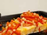 Salmón al horno con tomate y pimentón