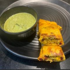 A picture of Veg Stuffed Moong Dal wrap.