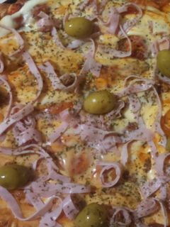 Una foto de Pizza Casera Fácil versión clásica"
