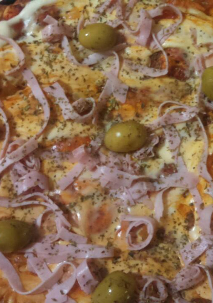Una foto de Pizza Casera Fácil versión clásica"