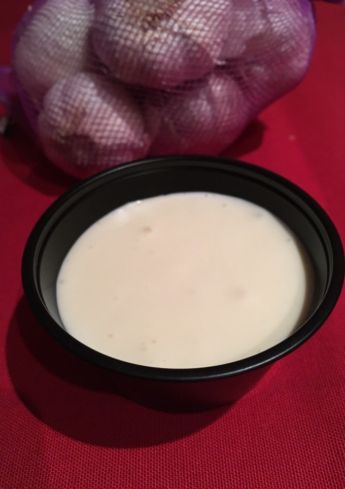 Una foto de Salsa alioli