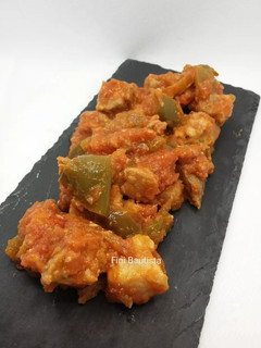 Una foto de Magra de cerdo con tomate